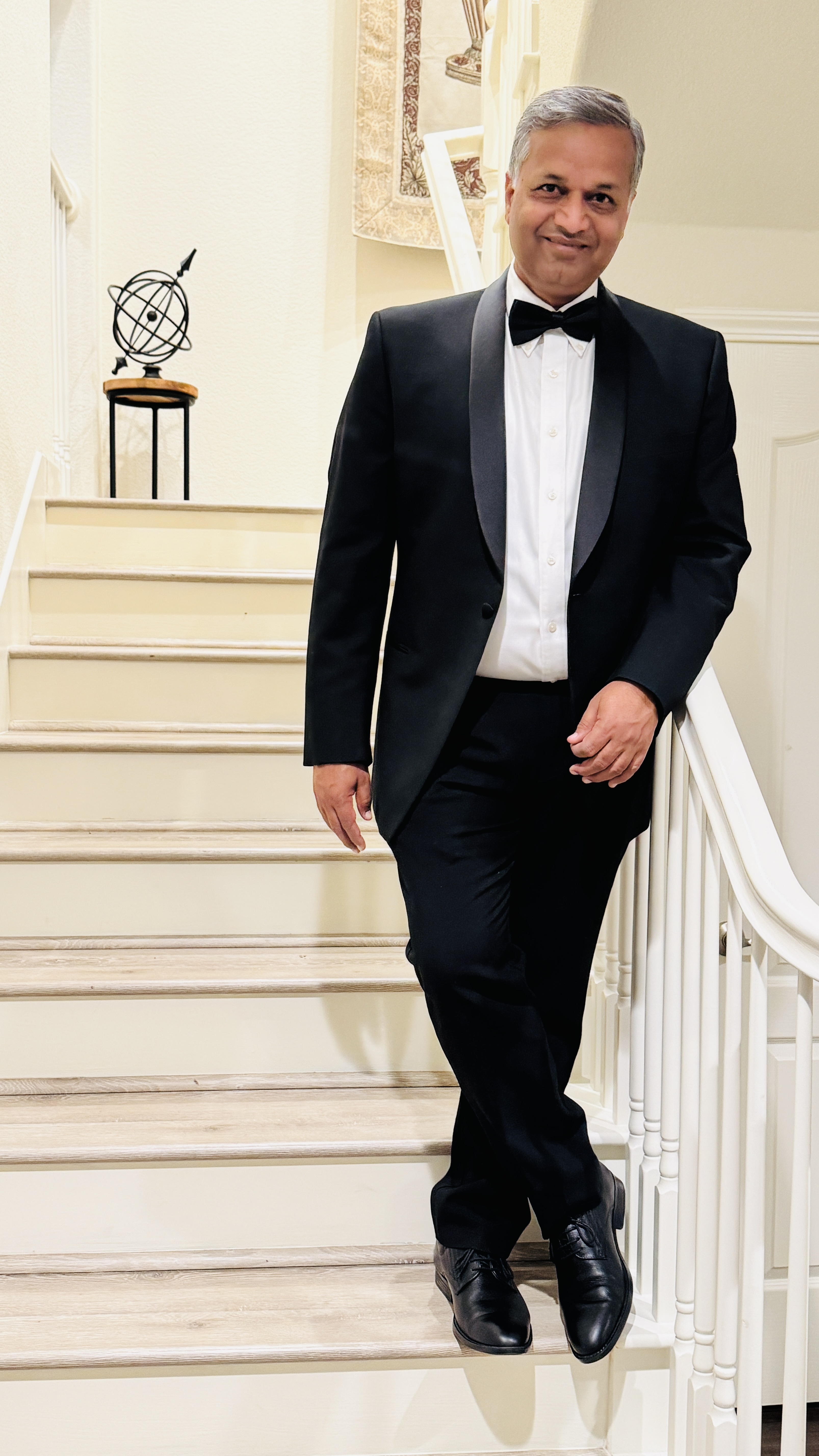 Portrait of Mahesh Baxi in formal attire